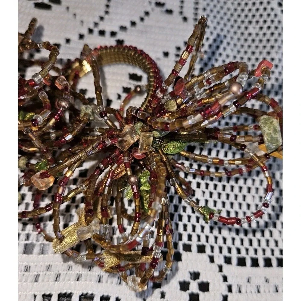 Pier One Set Of 7 Beaded Napkin Rings Fall Starburst Red‎ Brown Green Orange